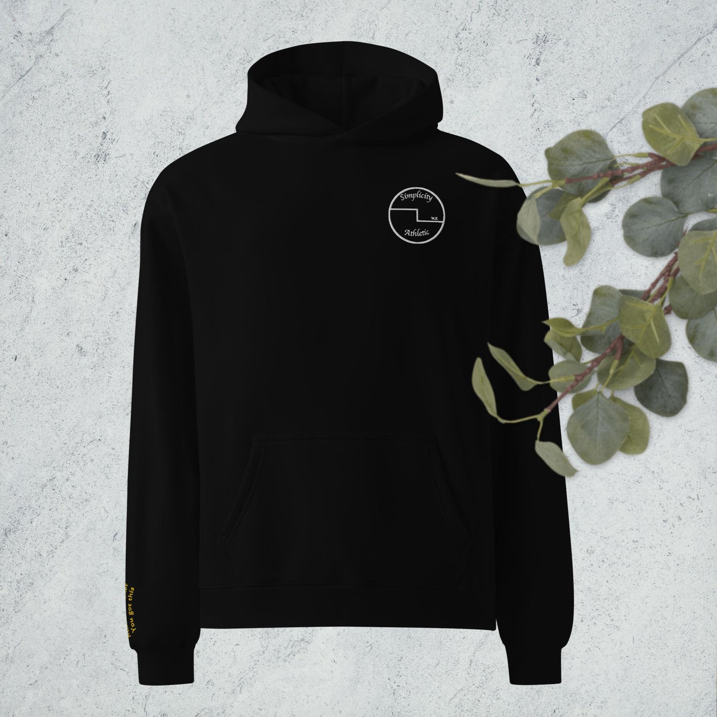 Curling oversized hoodie with embroidered encouragement on the sleeve and curling house printed on the back