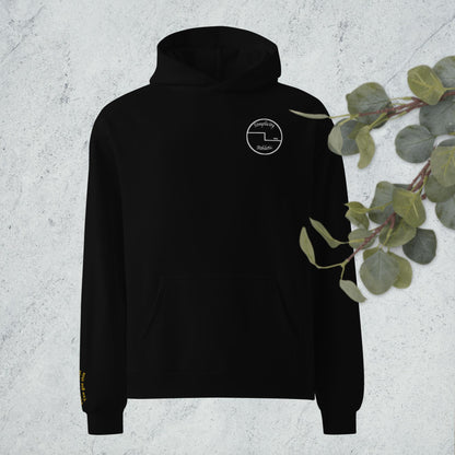 Curling oversized hoodie with embroidered encouragement on the sleeve and curling house printed on the back