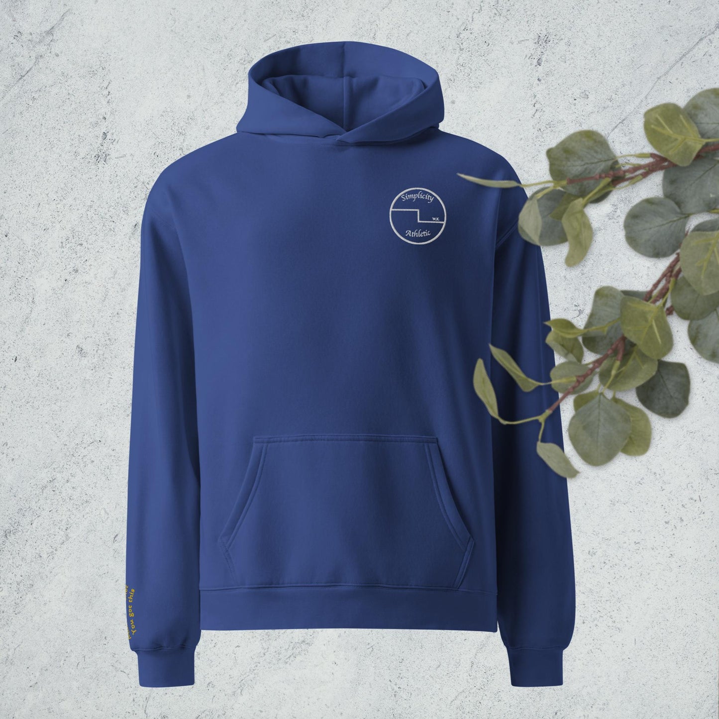 Curling oversized hoodie with embroidered encouragement on the sleeve and curling house printed on the back