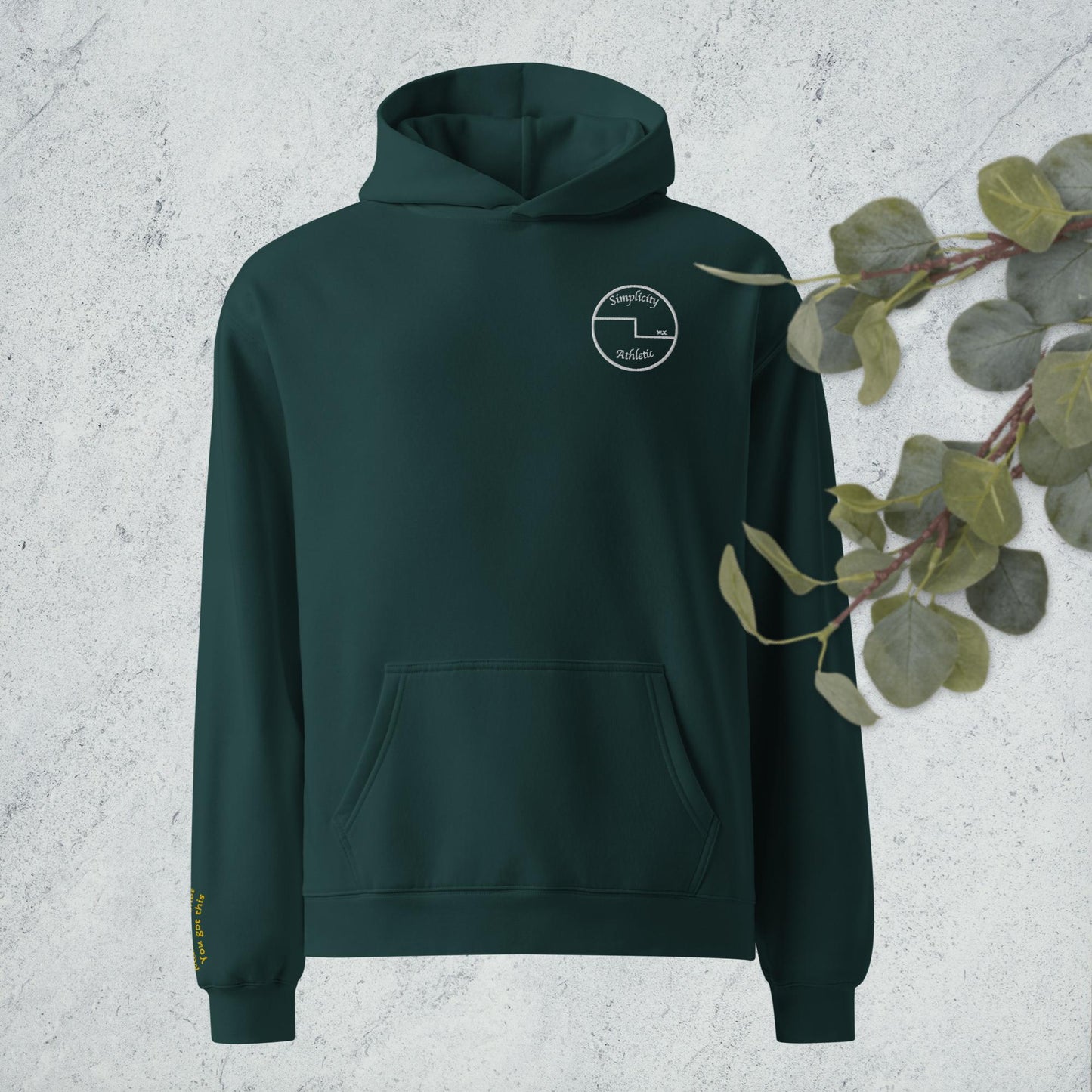 Curling oversized hoodie with embroidered encouragement on the sleeve and curling house printed on the back